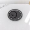 Difusor Mobile Mini portátil visto desde arriba sobre una mesa, ideal para aromatizar autos y espacios pequeños